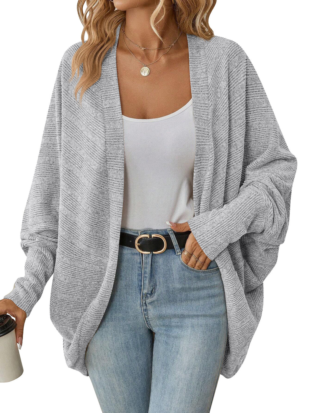 Light gray open-front batwing knit cardigan on a model, with ribbed cuffs and a draped hem