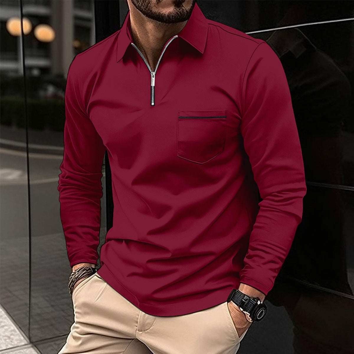 Burgundy long-sleeve quarter-zip polo on a male model, with a contrast-trim chest pocket