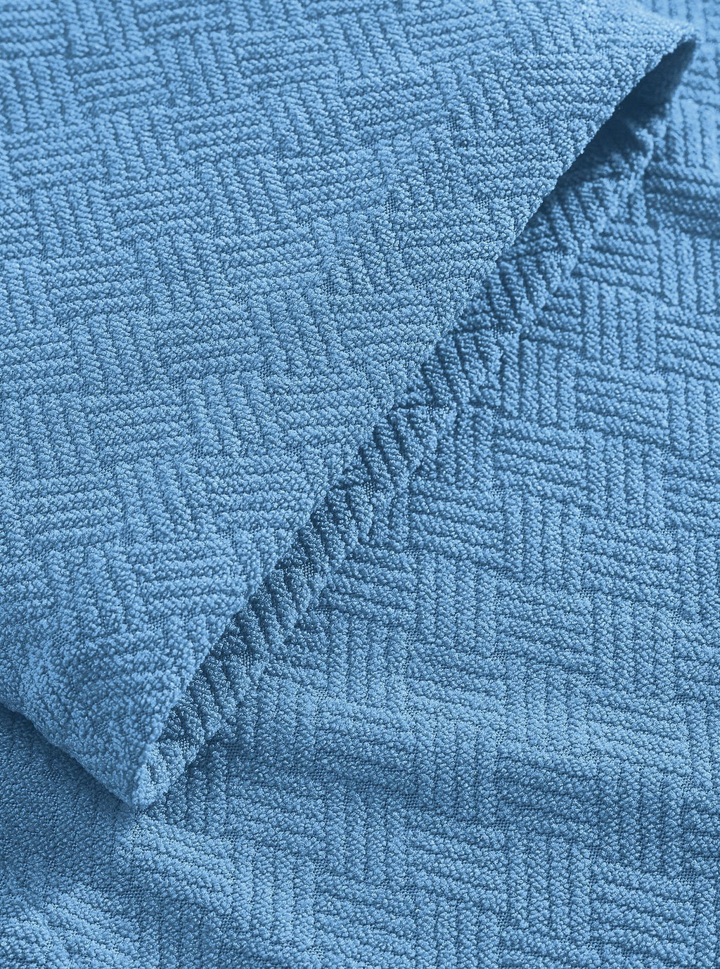 Blue bathrobe cuff and hem stitching in the fine square terry fabric