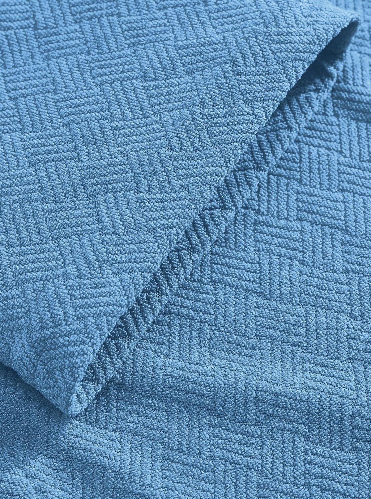Blue bathrobe cuff and hem stitching in the fine square terry fabric