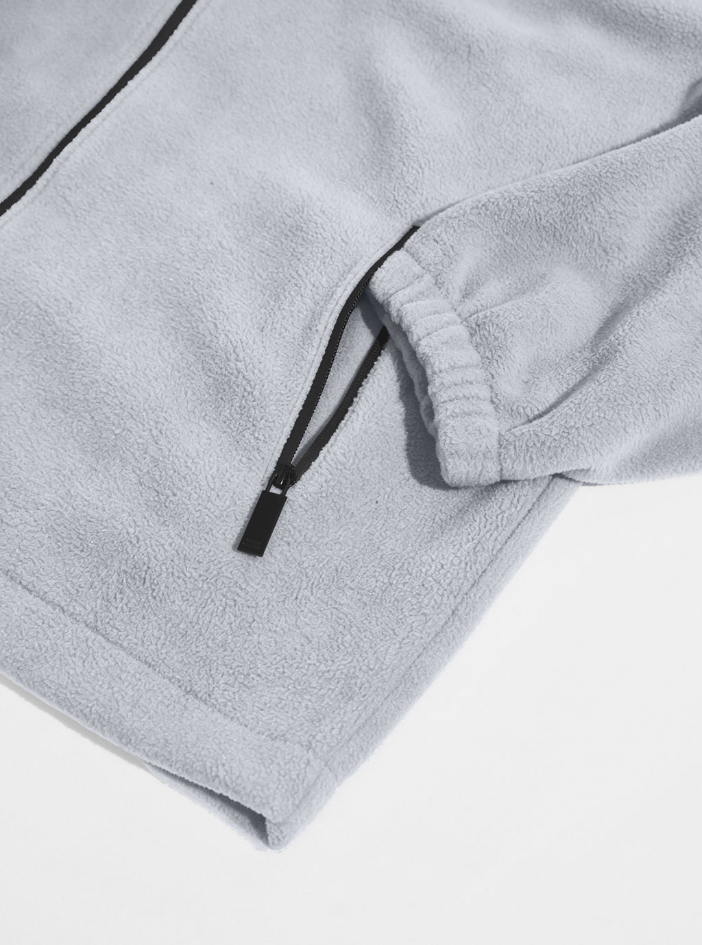 Light gray fleece jacket zippered hand pocket, elastic cuff and hem detail