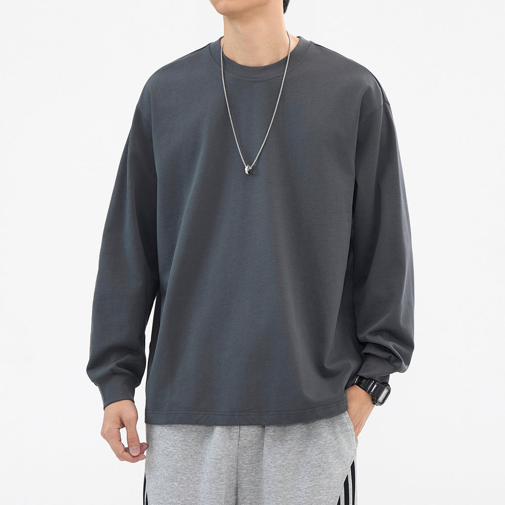 Dark gray relaxed crewneck long-sleeve top, front view