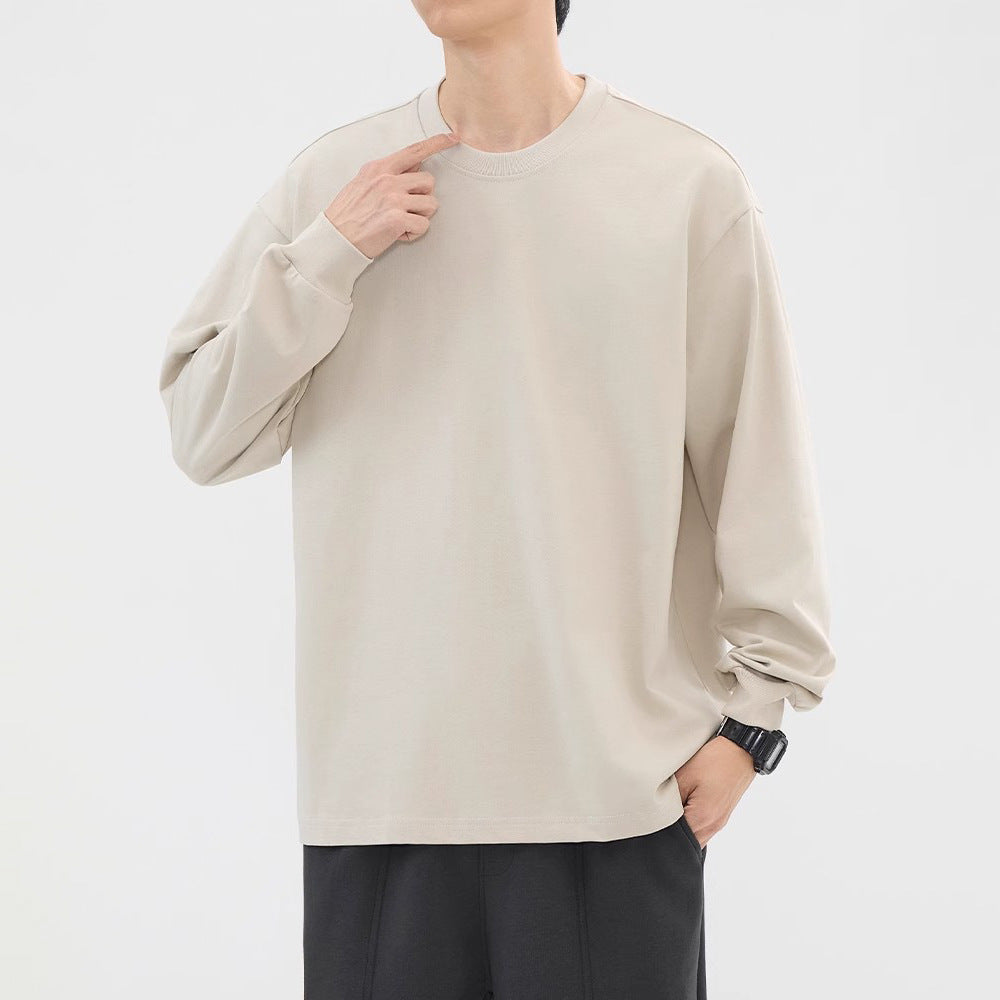 Beige relaxed crewneck long-sleeve top, front view