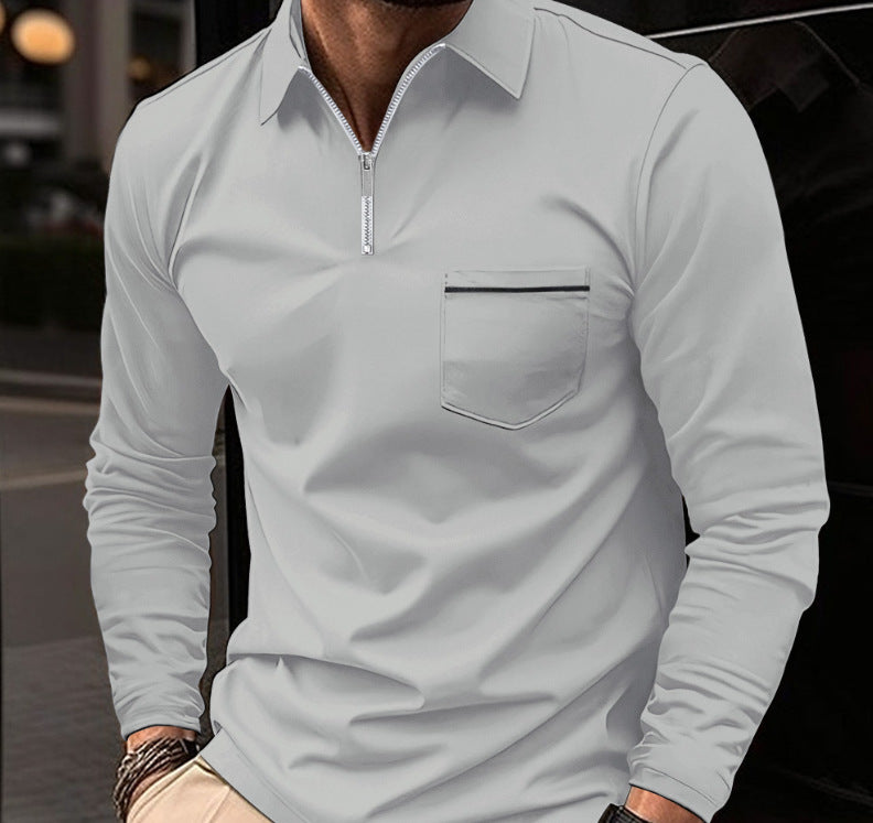Gray long-sleeve quarter-zip polo on a male model, with a contrast-trim chest pocket