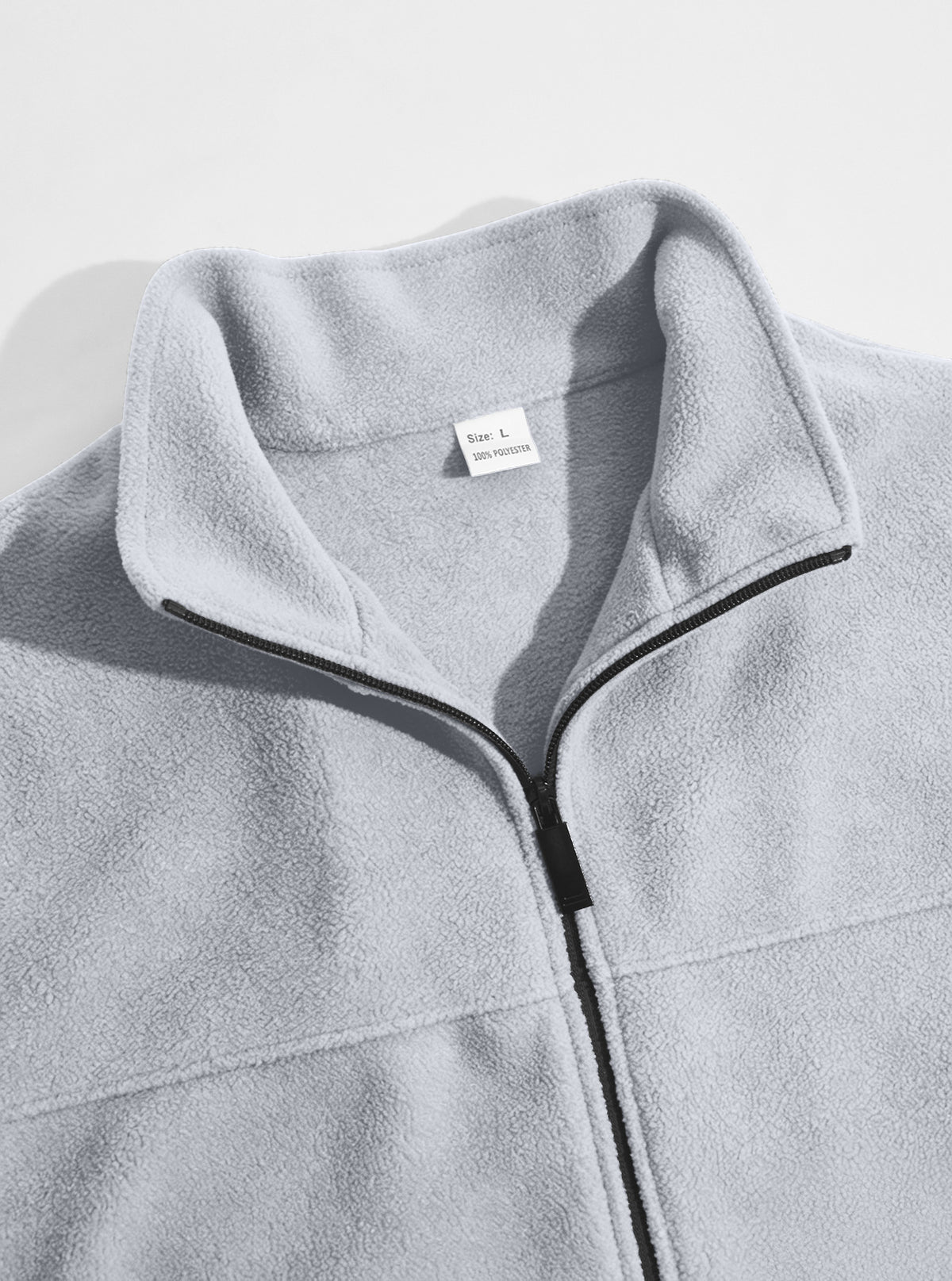 Light gray fleece jacket stand collar, chest seam and front zipper detail
