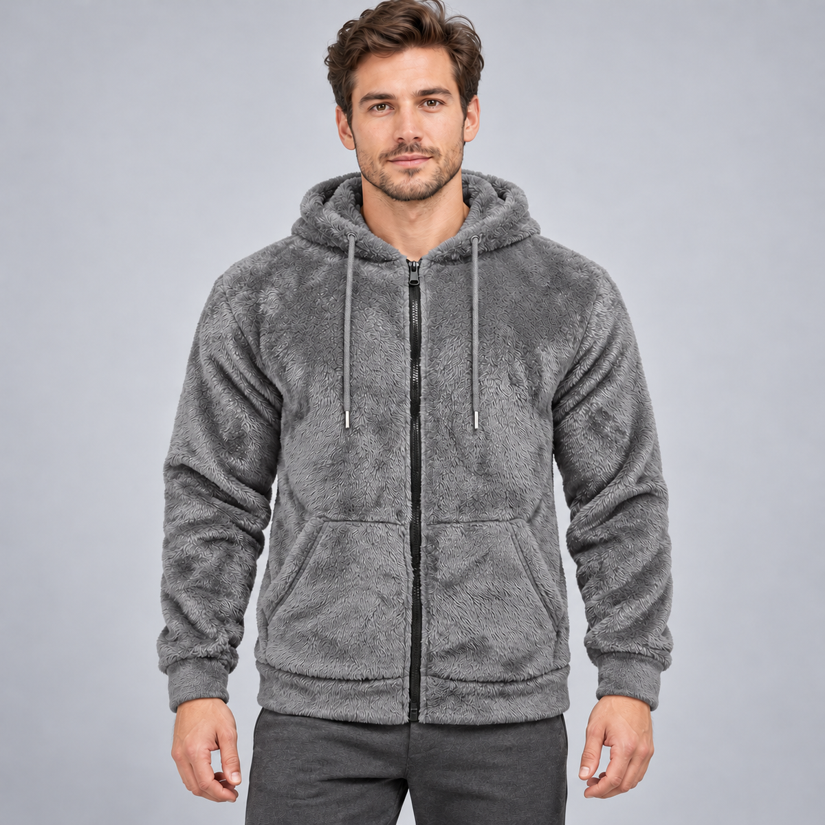 Gray textured fleece zip-up hoodie on an adult male model; AI-styled image based on confirmed garment and fabric references.