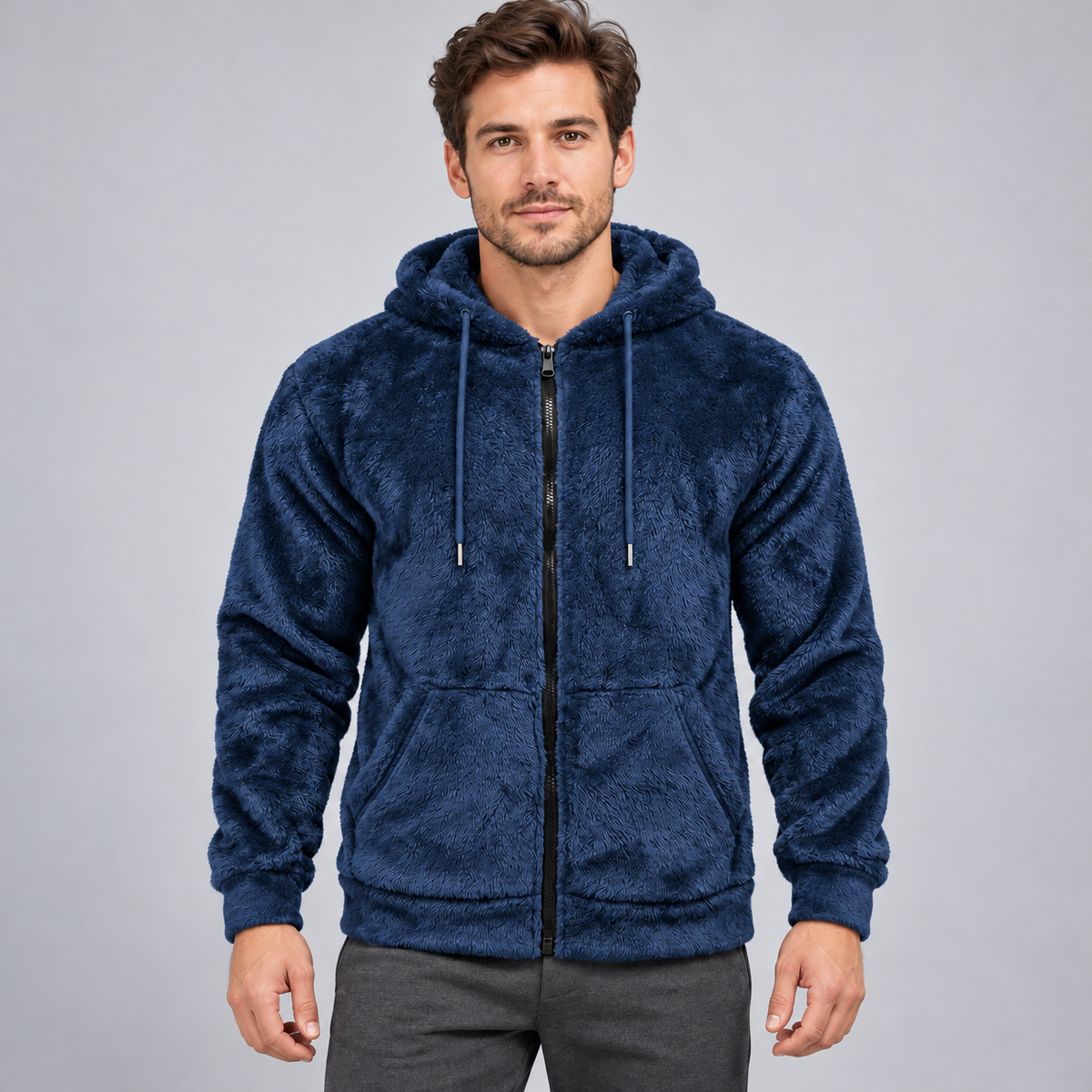Navy textured fleece zip-up hoodie on an adult male model; AI-styled color visualization using confirmed garment and fabric references.