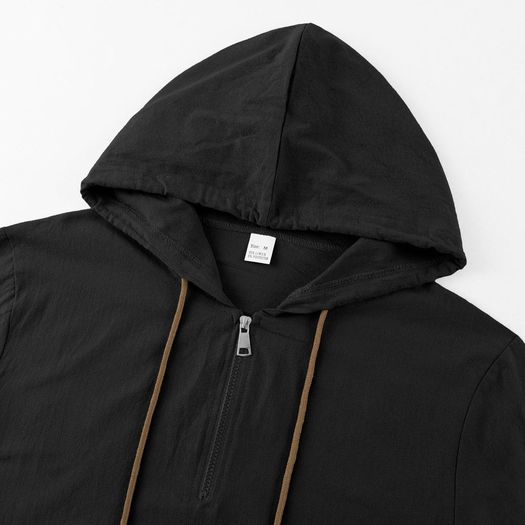 Black half-zip hoodie neckline and brown drawstrings