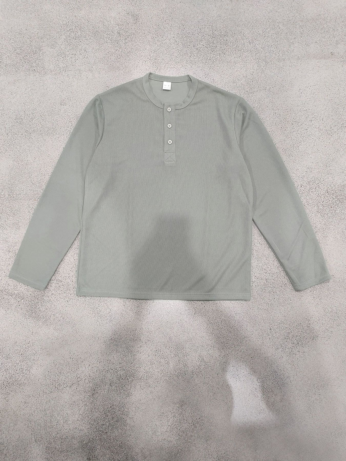 Light green Henley front flat-lay