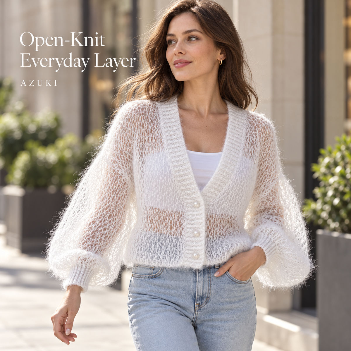 AZUKI white open-knit cardigan styled with jeans on a city sidewalk, AI-styled view
