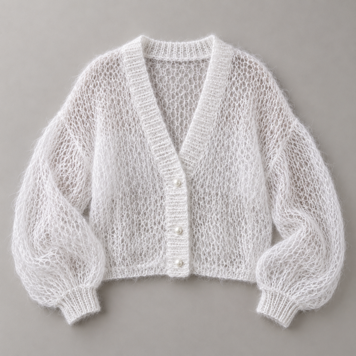 AZUKI white open-knit cardigan with three buttons and balloon sleeves, AI-styled flat lay