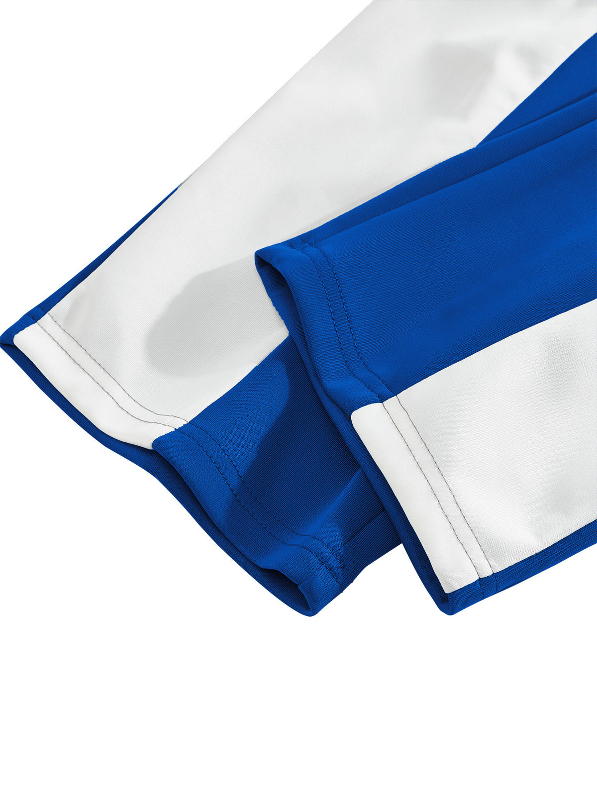 Close-up of stitched open leg hems on AZUKI blue and white colorblock pants