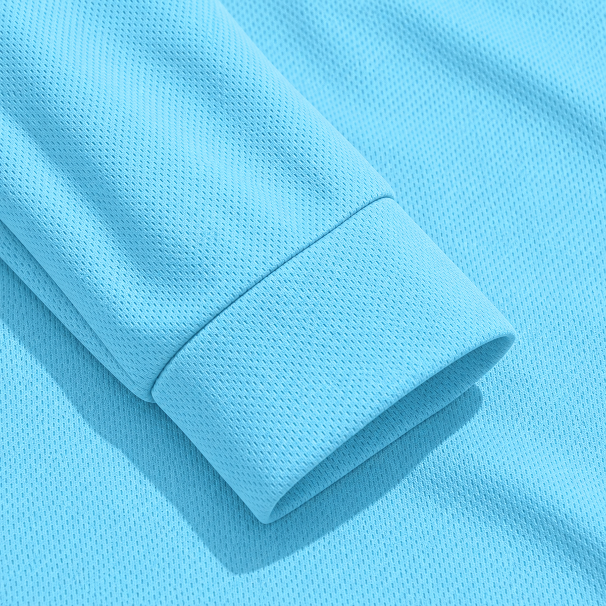 AZUKI light blue long-sleeve birdseye pocket polo — cuff