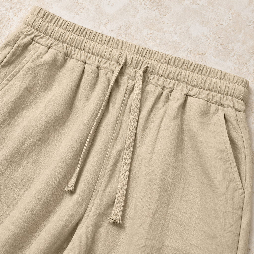 Khaki elastic waistband and braided drawcord detail