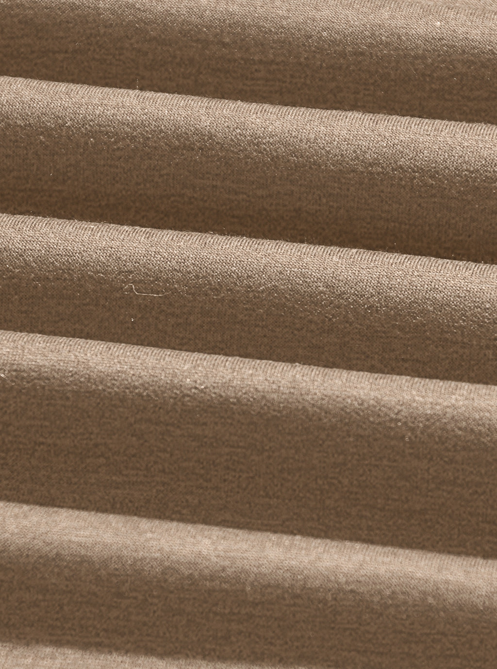 Close-up of the heather camel cotton-blend knit fabric